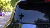 Bike Riding Surfing Sticker on a Rear Car Window (New) example