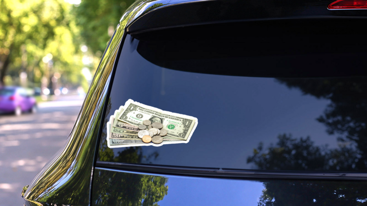 Bills and Coins Sticker on a Rear Car Window (New) example