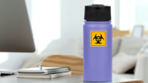 Biohazard Sign, Biohazard Sign In Yellow Sticker on a Water Bottle (New) example