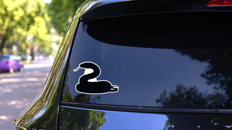 Black Silhouette Snake Cartoon Sticker on a Rear Car Window (New) example