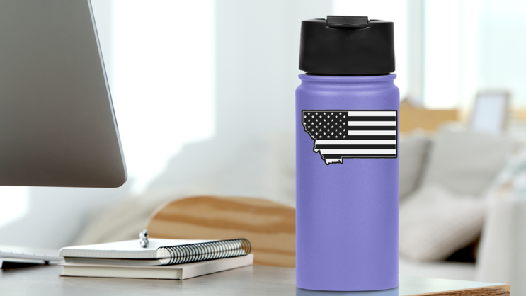Black USA Flag Montana Sticker on a Water Bottle (New) example