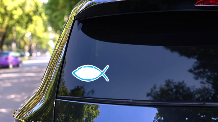 Blue Christian Fish Icon Sticker on a Rear Car Window (New) example