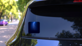 Blue Lightning Bolt Sticker on a Rear Car Window (New) example