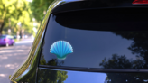 Blue Scallop Seashell Sticker on a Rear Car Window (New) example