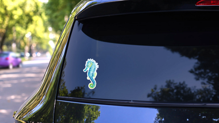 Blue Watercolor Seahorse Sticker on a Rear Car Window (New) example