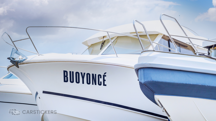A decal on a boat with the name Buoyoncé.