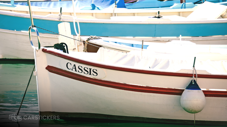 A decal on a boat with the name of a port.