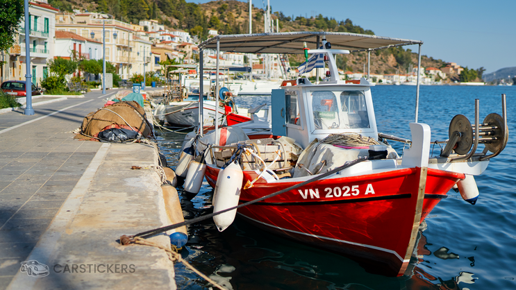 Registration decal on the side of a fishing boat.