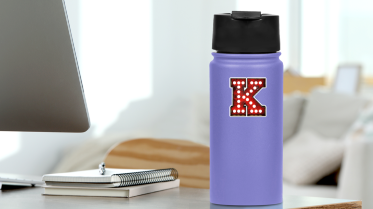 Broadway Style Light Bulb Font Letter K Sticker on a Water Bottle (New) example
