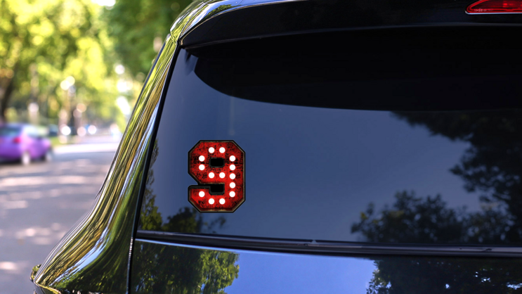 Broadway Style Light Bulb Font Number 9 Sticker on a Rear Car Window (New) example