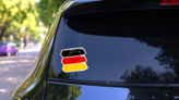 Brush Strokes Flag Of Germany Sticker on a Rear Car Window (New) example