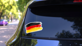 Brush Strokes German Flag Sticker on a Rear Car Window (New) example