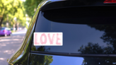 Brush Text Love Word Sticker on a Rear Car Window (New) example