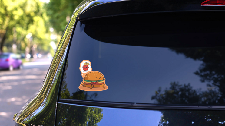 Burger Character Dreaming Of French Fries Sticker on a Rear Car Window (New) example