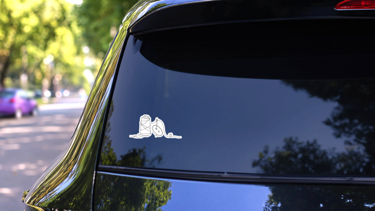 Button On Sewing Thread Sticker on a Rear Car Window (New) example