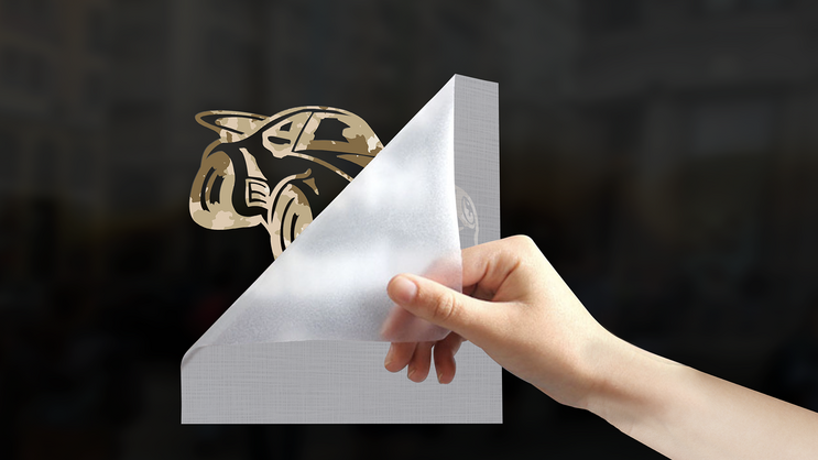 Camo Transfer Sticker Being Applied To Window