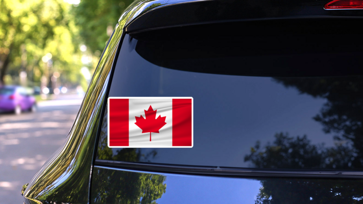 Canada National Flag with Ripples Sticker on a Rear Car Window (New) example