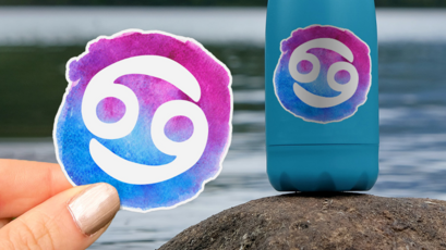 Custom Cancer Zodiac Sticker in Hand and On Water Bottle