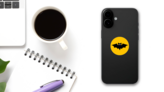 Cartoon Bat On Orange Background Sticker on a Phone (New) example
