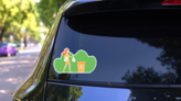 Cartoon Girl Recycling Sticker on a Rear Car Window (New) example