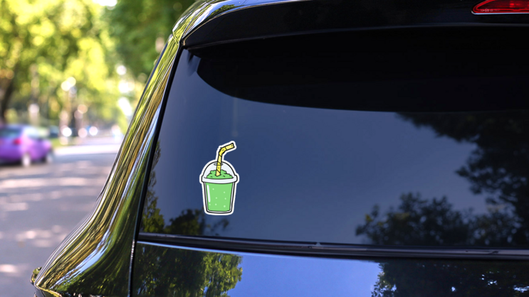 Cartoon Iced Green Apple Smoothie Sticker on a Rear Car Window (New) example