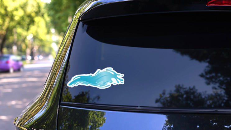 Cartoon Splashing Wave Sticker on a Rear Car Window (New) example