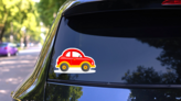 Cartoon Toy Car Sticker on a Rear Car Window (New) example