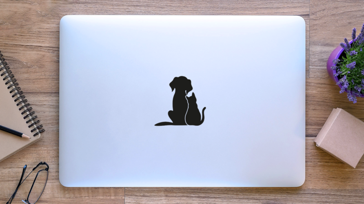 Cat And Dog Friends Sticker on a Laptop (New) example