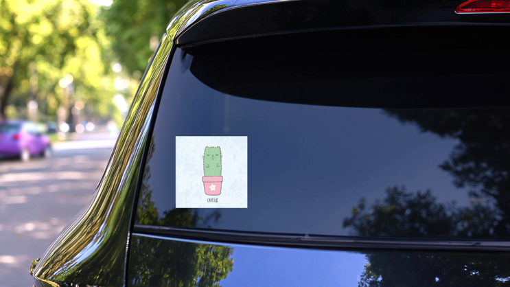 Cat Cactus In A Flowerpot Sticker on a Rear Car Window (New) example