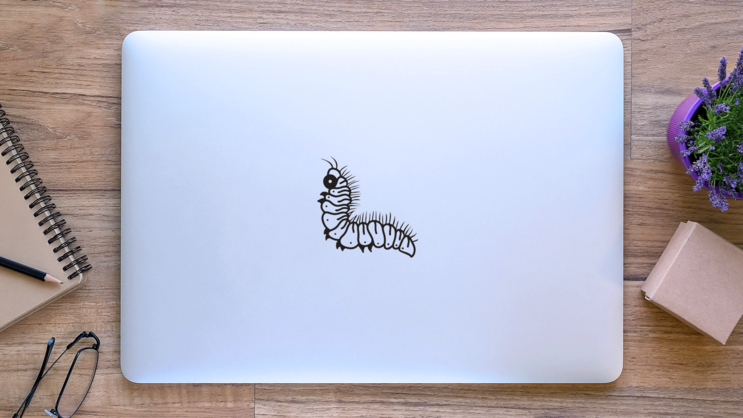 Caterpillar Graphic Illustration Sticker on a Laptop (New) example