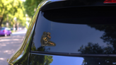 Celestial Woman Holding Serpent Sticker on a Rear Car Window (New) example