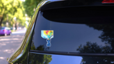Chakra Power Watercolor Sticker on a Rear Car Window (New) example
