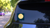 Cheese Moon Sticker on a Rear Car Window (New) example