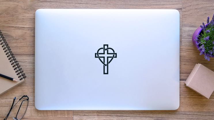 Christian Cross And Heart Sticker on a Laptop (New) example
