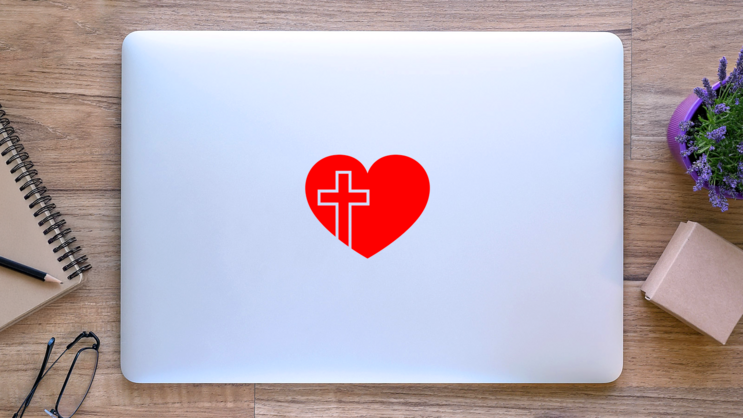 Christian Cross In Heart Transfer Sticker on a Laptop (New) example