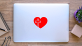 Christian Cross In Heart Transfer Sticker on a Laptop (New) example