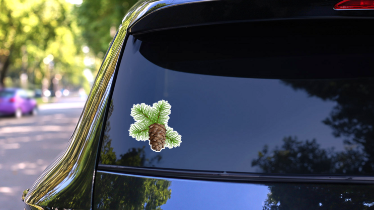 Christmas Tree Branch Hanging Pine Cone Sticker on a Rear Car Window (New) example