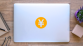 Circle Japanese Yen Sticker on a Laptop (New) example