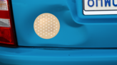 Circlular Band Aid Bandage Sticker on a Dented Car example