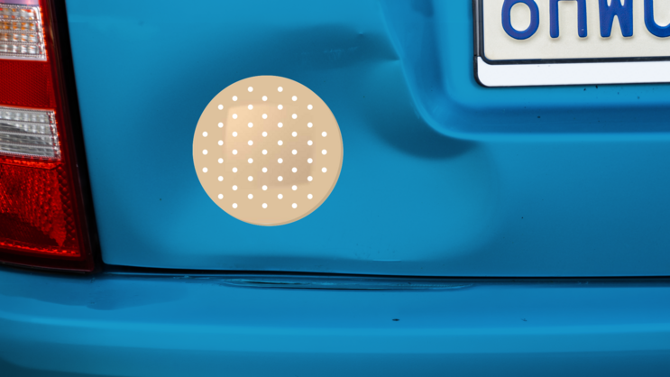 Circlular Band Aid Bandage Sticker on a Dented Car example