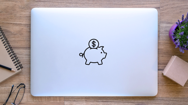 Classic Piggy Bank Sticker on a Laptop (New) example