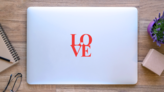 Classic Red Love Text Sticker on a Laptop (New) example