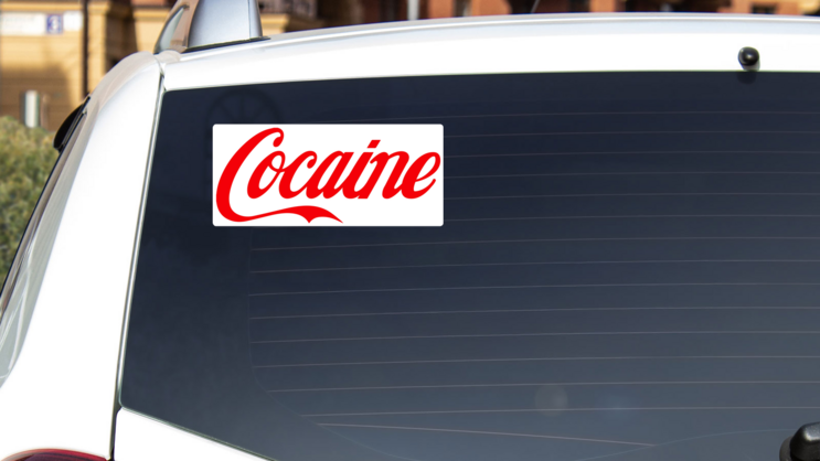 Cocaine Bumper Sticker on a White Car Rear Window example