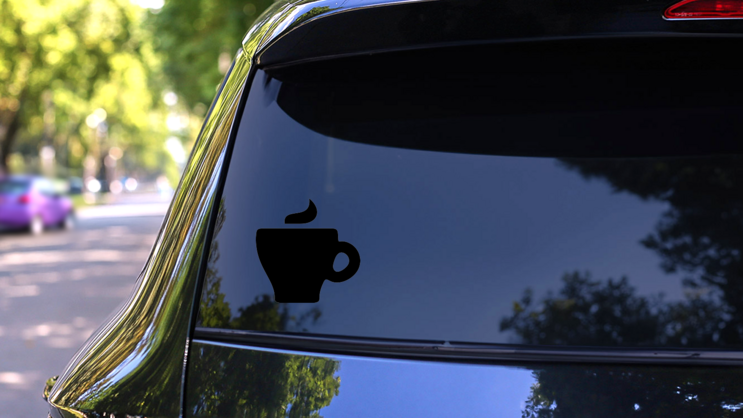 Coffee Mug with Steam Transfer Sticker on a Rear Car Window (New) example