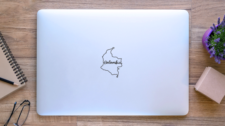 Colombia Outline Map Handwritten Lettering Sticker on a Laptop (New) example