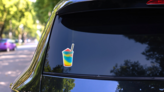 Colored Slush Ice In A Cup Sweet Treat Sticker on a Rear Car Window (New) example