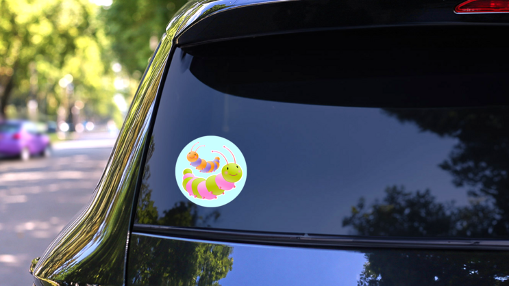 Colorful Cute Smiling Caterpillars Sticker on a Rear Car Window (New) example