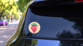 Colorful Strawberry Retro Sticker on a Rear Car Window (New) example