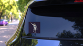 Comic Astronaut Reaching the Stars Sticker on a Rear Car Window (New) example