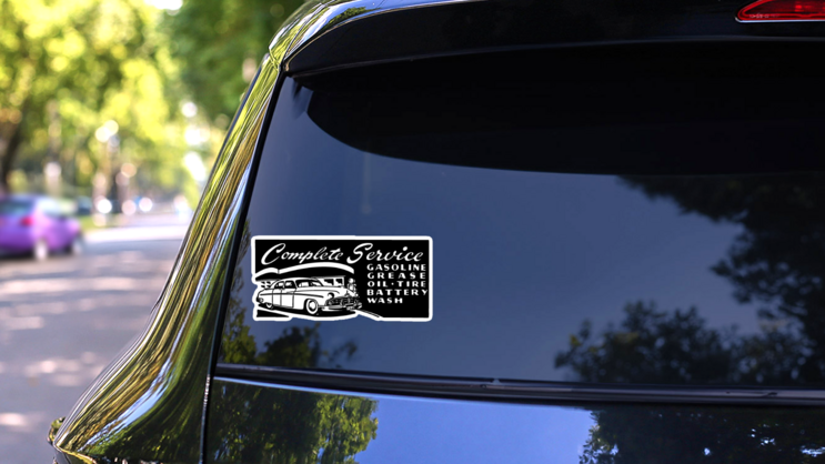 Complete Service - Retro Ad Mechanic Sticker on a Rear Car Window (New) example